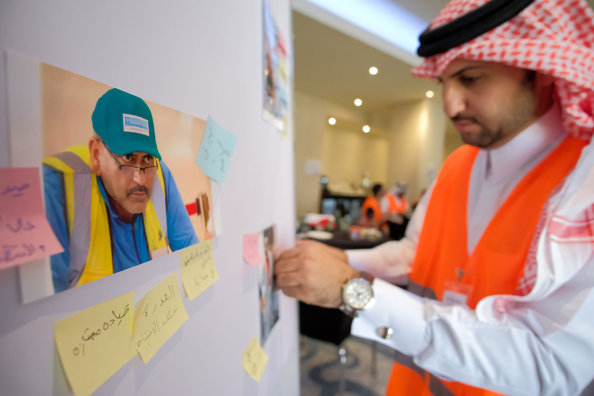 Qatari man brainstorming ideas in a leadership workshop