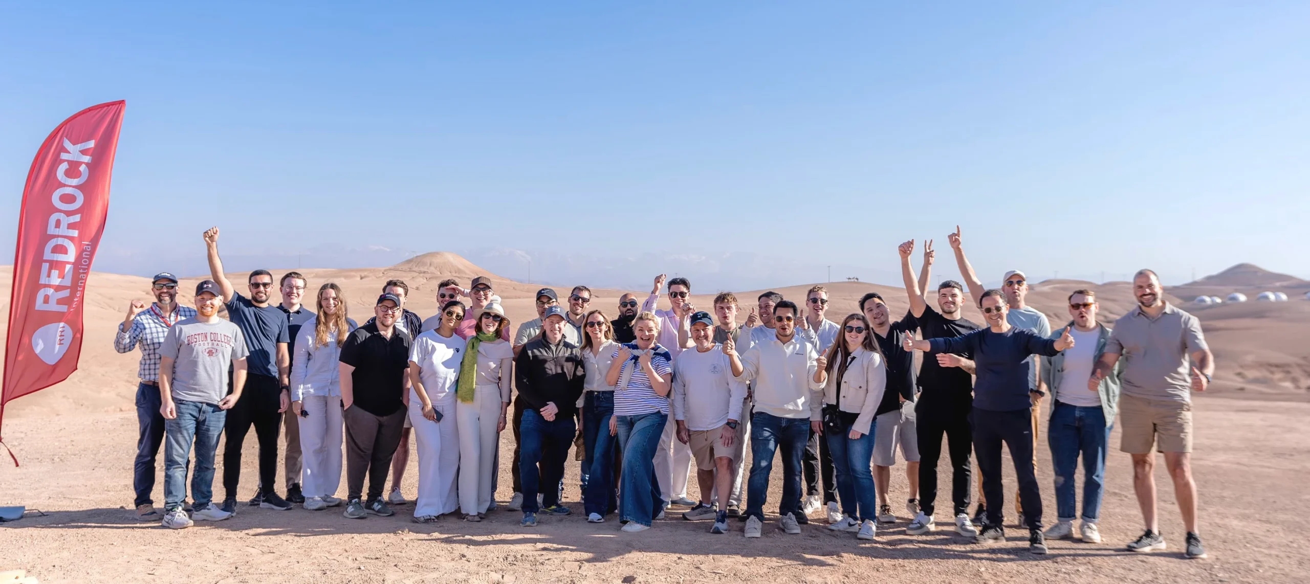 Red Rock trainer guiding team building participants in Morocco
